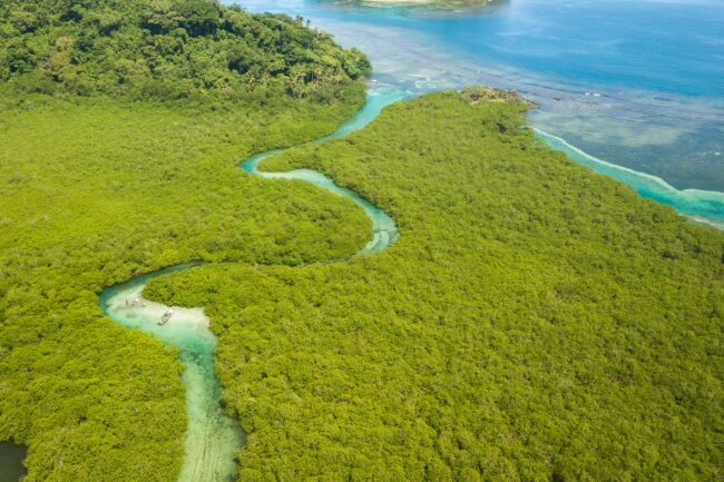 turquoise river that flows into the Atlantic Ocean in Panama